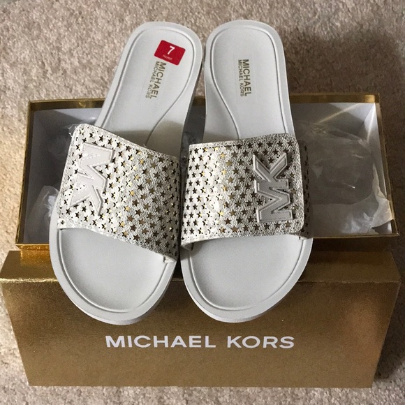 Michael Kors Shoes - MICHAEL KORS slide lasered mini MK